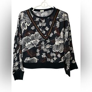 Warm Black and White V-Neck Sweater with Floral Design
